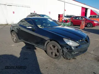 2006 Mercedes-Benz SLK-Class 3.0L with VIN WDBWK54F66F114895, listed as a IAAI auction lot 41409991 with 128,962 mi miles. Bid and sale history available at carsss.com. Image 1.