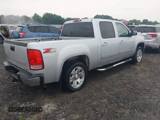2013 GMC Sierra 1500 SLT with VIN 3GTP2WE74DG115414, listed as a IAAI auction lot 42441966 with 291,605 mi miles and . Bid and sale history available at DreamBid. Image 4.