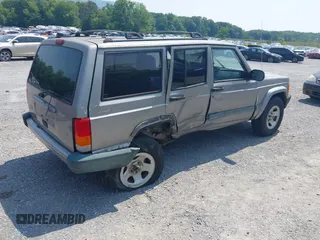2000 Jeep Cherokee with VIN 1J4FF48S5YL174768, listed as a IAAI auction lot 42411154 with 204,428 mi miles and . Bid and sale history available at DreamBid. Image 4.