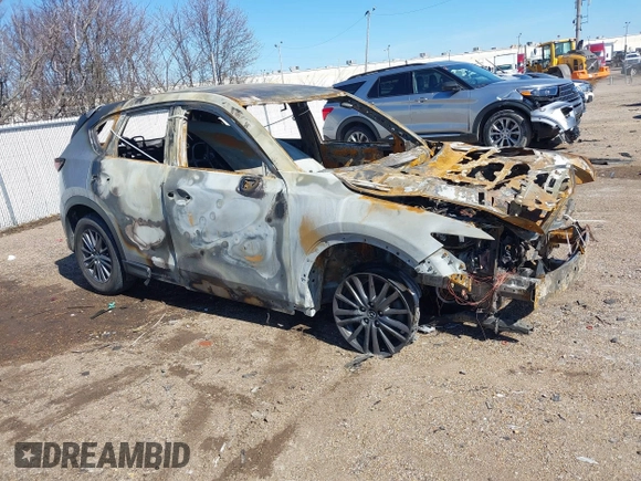 2020 Mazda CX-5 Touring with VIN JM3KFACMXL1789954, listed as a IAAI auction lot 41611431 with 1 mi miles. Bid and sale history available at carsss.com. Image 1.
