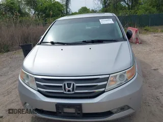 2012 Honda Odyssey Touring with VIN 5FNRL5H92CB055473, listed as a IAAI auction lot 42128601 with 163,901 mi miles. Bid and sale history available at carsss.com. Image 12.