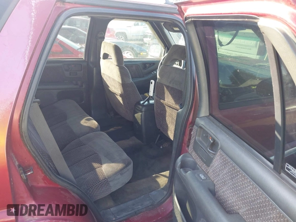 1995 GMC Jimmy SLE z VIN 1GKDT13W1SK528155, wystawiony jako IAAI lot #42177589 z przebiegiem 283 900 mil mil oraz . Historia ofert i sprzedaży dostępna na DreamBid. Obrazek 8.
