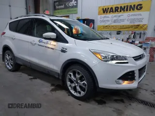 2016 Ford Escape Titanium with VIN 1FMCU9J94GUC79910, listed as a IAAI auction lot 41644467 with 43,261 mi miles. Bid and sale history available at carsss.com. Image 1.