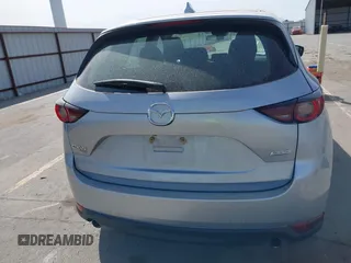 2019 Mazda CX-5 Sport with VIN JM3KFBBM6K1582760, listed as a IAAI auction lot 41822152 with 60,620 mi miles and . Bid and sale history available at DreamBid. Image 16.