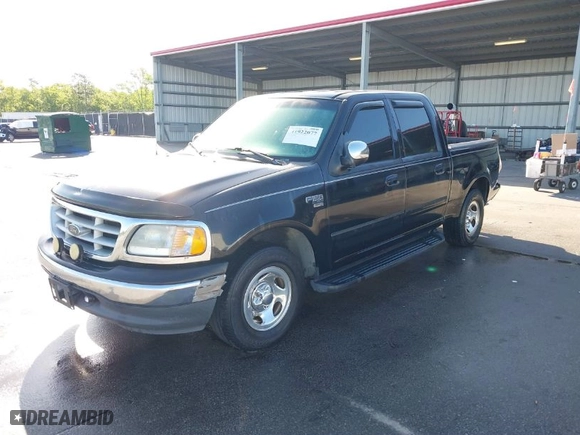 2001 Ford F-150 SuperCrew XLT with VIN 1FTRW07W41KA13131, listed as a IAAI auction lot 41922077 with 1 mi miles. Bid and sale history available at carsss.com. Image 2.