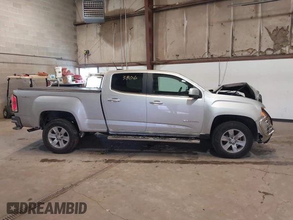2015 GMC Canyon 4WD SLE with VIN 1GTG6BE36F1124627, listed as a IAAI auction lot 41623806 with 104,182 mi miles and . Bid and sale history available at carsss.com. Image 13.