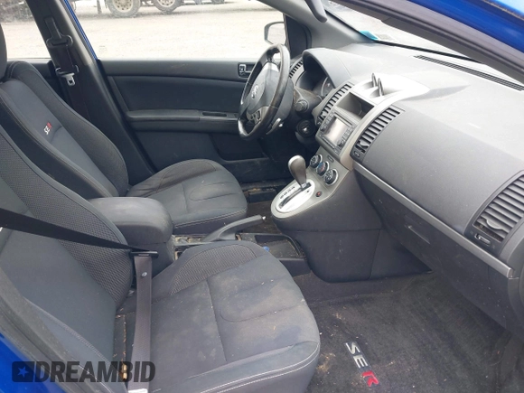 2011 Nissan Sentra SE-R z VIN 3N1BB6AP1BL606935, wystawiony jako IAAI lot #42233917 z przebiegiem 204 941 mil mil oraz . Historia ofert i sprzedaży dostępna na DreamBid. Obrazek 5.