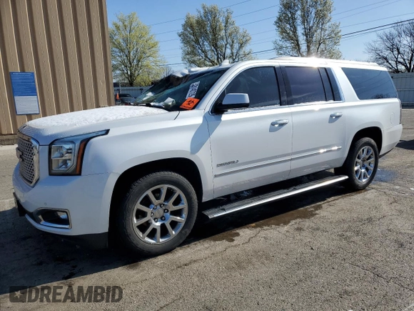 2017 GMC Yukon XL Denali with VIN 1GKS2HKJ5HR139365, listed as a Copart auction lot 52140725 with 135,079 mi miles and Salvage Title. Bid and sale history available at carsss.com. Image 1.