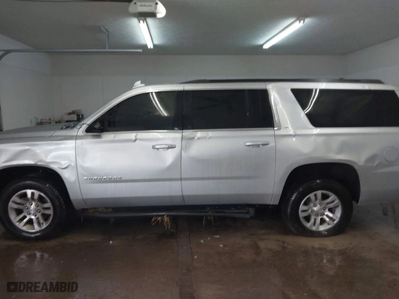 2019 Chevrolet Suburban LT with VIN 1GNSKHKC8KR185851, listed as a IAAI auction lot 41604664 with NaN miles. Bid and sale history available at carsss.com. Image 15.