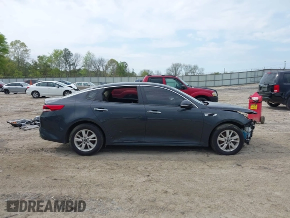 2016 Kia Optima LX with VIN 5XXGT4L38GG023697, listed as a IAAI auction lot 41976461 with 131,023 mi miles. Bid and sale history available at carsss.com. Image 13.
