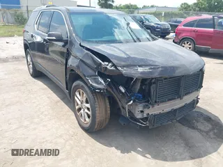 2018 Chevrolet Traverse LT Cloth z VIN 1GNEVGKW9JJ225313, wystawiony jako IAAI lot #42159410 z przebiegiem 123 848 mil mil oraz . Historia ofert i sprzedaży dostępna na DreamBid. Obrazek 1.