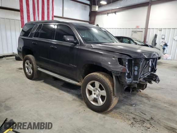 2015 Chevrolet Tahoe LT with VIN 1GNSCBKC3FR112306, listed as a Copart auction lot 51282355 with 136,492 mi miles and Salvage Title. Bid and sale history available at DreamBid. Image 4.