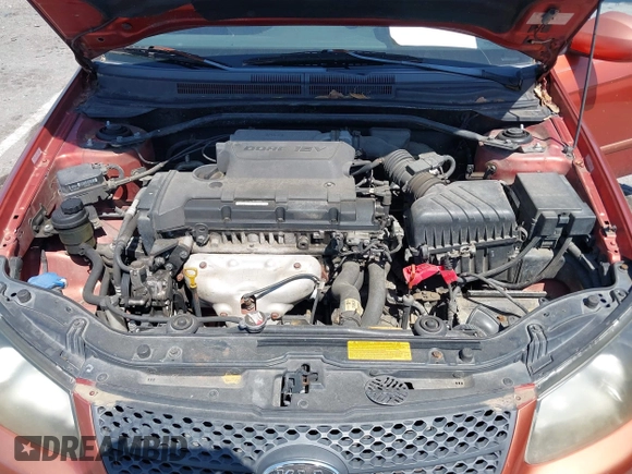 2009 Kia Spectra EX with VIN KNAFE221195026956, listed as a IAAI auction lot 42019309 with 121,341 mi miles. Bid and sale history available at carsss.com. Image 10.