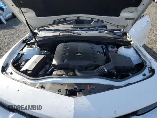 2014 Chevrolet Camaro LT z VIN 2G1FC1E39E9242379, wystawiony jako Copart lot #48046105 z przebiegiem 88 758 mil mil oraz Szkoda całkowita • Salvage title. Historia ofert i sprzedaży dostępna na DreamBid. Obrazek 13.