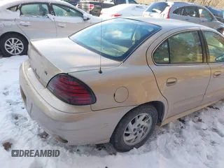 2004 Pontiac Grand Am SE with VIN 1G2NE52F24C231559, listed as a IAAI auction lot 41606544 with 65,524 mi miles. Bid and sale history available at carsss.com. Image 16.
