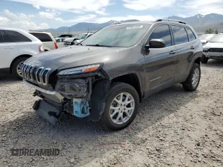 2018 Jeep Cherokee Latitude Plus with VIN 1C4PJMLX0JD562180, listed as a Copart auction lot 57631285 with 105,923 mi miles and Salvage title. Bid and sale history available at DreamBid. Image 1.
