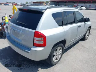 2008 Jeep Compass Sport with VIN 1J8FT47048D767281, listed as a IAAI auction lot 42010343 with 164,734 mi miles. Bid and sale history available at carsss.com. Image 4.