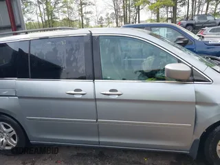 2006 Honda Odyssey EX with VIN 5FNRL38406B066176, listed as a IAAI auction lot 42028052 with 136,305 mi miles and . Bid and sale history available at DreamBid. Image 14.