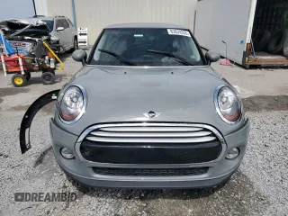 2014 MINI Hardtop with VIN WMWXM5C51ET934047, listed as a Copart auction lot 63039335 with 104,446 mi miles and Salvage title. Bid and sale history available at DreamBid. Image 5.