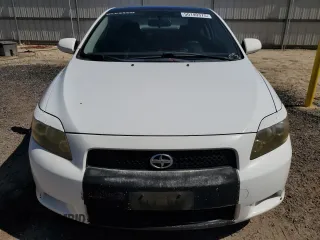 2008 Scion tC Spec z VIN JTKDE167480234496, wystawiony jako Copart lot #50149375 z przebiegiem 157 625 mil mil oraz Szkoda całkowita • Salvage title. Historia ofert i sprzedaży dostępna na DreamBid. Obrazek 5.