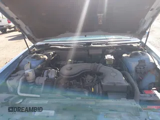 1988 Cadillac Fleetwood z VIN 1G6CB5152J4228237, wystawiony jako IAAI lot #42232983 z przebiegiem Nie podano mil oraz . Historia ofert i sprzedaży dostępna na DreamBid. Obrazek 10.