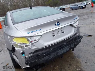 2013 Hyundai Sonata Hybrid with VIN KMHEC4A44DA077276, listed as a IAAI auction lot 41752360 with 62,700 mi miles. Bid and sale history available at carsss.com. Image 6.