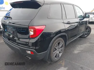 2021 Honda Passport EX-L with VIN 5FNYF7H5XMB013923, listed as a IAAI auction lot 41669295 with 42,969 mi miles. Bid and sale history available at carsss.com. Image 4.