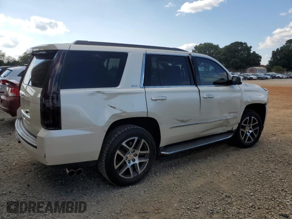 2015 GMC Yukon SLT with VIN 1GKS2BKC1FR736203, listed as a Copart auction lot 67977694 with 178,781 mi miles and Salvage Title. Bid and sale history available at carsss.com. Image 3.