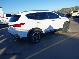2020 Hyundai Santa Fe Limited with VIN 5NMS53AA9LH213746, listed as a IAAI auction lot 41306902 with 55,713 mi miles and . Bid and sale history available at DreamBid. Image 4.