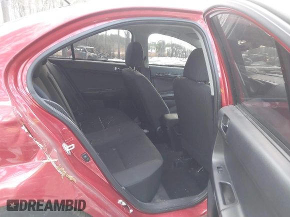 2016 Mitsubishi Lancer SE with VIN JA32V2FW7GU004159, listed as a IAAI auction lot 41401386 with 100,536 mi miles. Bid and sale history available at carsss.com. Image 8.