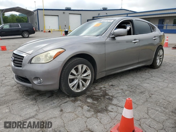 2013 Infiniti M with VIN JN1BY1AR2DM601965, listed as a Copart auction lot 62014215 with 134,047 mi miles and Salvage title. Bid and sale history available at DreamBid. Image 1.