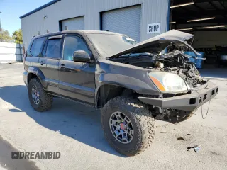 2005 Lexus GX 470 with VIN JTJBT20X650068722, listed as a Copart auction lot 62931984 with 247,819 mi miles and Salvage Title. Bid and sale history available at carsss.com. Image 4.