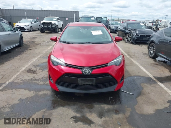 2019 Toyota Corolla L with VIN 5YFBURHE4KP883871, listed as a IAAI auction lot 41979494 with 179,078 mi miles. Bid and sale history available at carsss.com. Image 12.