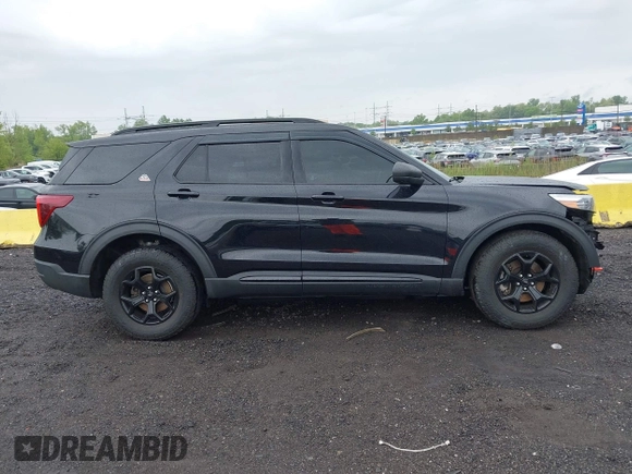 2022 Ford Explorer Timberline z VIN 1FMSK8JH0NGA82571, wystawiony jako IAAI lot #42244823 z przebiegiem 36 858 mil mil oraz . Historia ofert i sprzedaży dostępna na DreamBid. Obrazek 13.