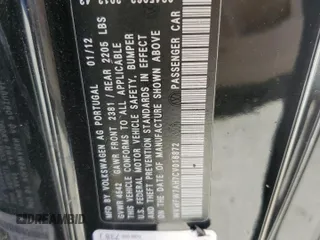 2012 Volkswagen Eos Lux with VIN WVWFW7AH7CV016872, listed as a Copart auction lot 52591415 with 121,130 mi miles and Salvage Title. Bid and sale history available at DreamBid. Image 12.