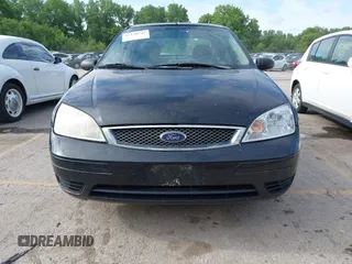 2007 Ford Focus S z VIN 1FAHP34N37W161610, wystawiony jako IAAI lot #42370742 z przebiegiem Nie podano mil oraz . Historia ofert i sprzedaży dostępna na DreamBid. Obrazek 6.