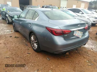 2019 Infiniti Q50 Luxe with VIN JN1EV7AP0KM513825, listed as a IAAI auction lot 41310796 with 92,131 mi miles and . Bid and sale history available at DreamBid. Image 3.