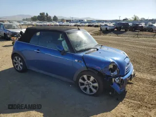 2005 MINI Convertible S z VIN WMWRH33565TK56154, wystawiony jako Copart lot #55860025 z przebiegiem 59 672 mil mil oraz Szkoda całkowita • Salvage title. Historia ofert i sprzedaży dostępna na DreamBid. Obrazek 4.
