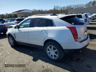 2015 Cadillac SRX Premium Collection with VIN 3GYFNGE38FS531756, listed as a Copart auction lot 47302885 with 143,342 mi miles and Salvage Title. Bid and sale history available at carsss.com. Image 2.