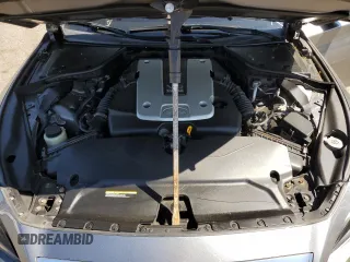 2015 Infiniti Q50 Premium z VIN JN1BV7ARXFM391291, wystawiony jako Copart lot #61765885 z przebiegiem 129 617 mil mil oraz Szkoda całkowita • Salvage title. Historia ofert i sprzedaży dostępna na DreamBid. Obrazek 11.