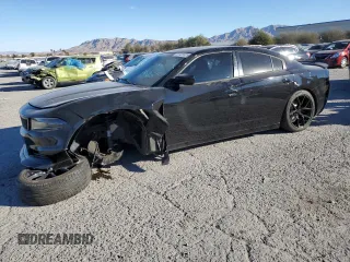 2015 Dodge Charger SXT with VIN 2C3CDXHG8FH769883, listed as a Copart auction lot 87723825 with 81,859 mi miles and Salvage Title. Bid and sale history available at DreamBid. Image 1.