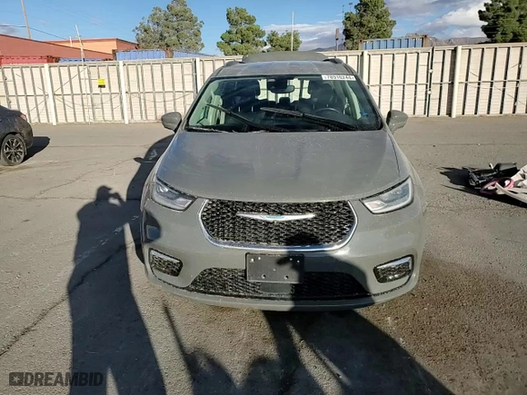 2021 Chrysler Pacifica Hybrid Touring L with VIN 2C4RC1L73MR581213, listed as a Copart auction lot 78910244 with 104,426 mi miles and Salvage Title. Bid and sale history available at carsss.com. Image 12.