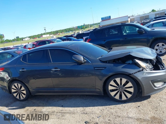 2011 Kia Optima SX z VIN KNAGR4A60B5126988, wystawiony jako IAAI lot #42313244 z przebiegiem 152 661 mil mil oraz . Historia ofert i sprzedaży dostępna na DreamBid. Obrazek 13.