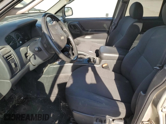 2004 Jeep Grand Cherokee Laredo with VIN 1J4GW48S34C307347, listed as a Copart auction lot 55749565 with Not provided miles and Salvage title. Bid and sale history available at DreamBid. Image 7.