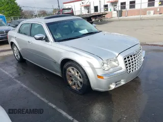 2006 Chrysler 300 C with VIN 2C3KA63H16H352507, listed as a IAAI auction lot 41926057 with 129,962 mi miles. Bid and sale history available at carsss.com. Image 1.