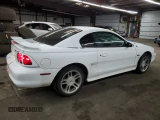 1997 Ford Mustang GT with VIN 1FALP42X3VF140564, listed as a Copart auction lot 44240605 with 120,738 mi miles and Salvage title. Bid and sale history available at DreamBid. Image 3.