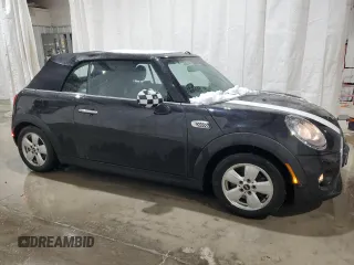 2017 MINI Convertible Cooper with VIN WMWWG5C36H3C99710, listed as a Copart auction lot 89058985 with 49,934 mi miles and Salvage title. Bid and sale history available at DreamBid. Image 4.