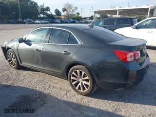 2014 Chevrolet Malibu LT with VIN 1G11E5SL6EF258708, listed as a IAAI auction lot 41452146 with 147,648 mi miles. Bid and sale history available at carsss.com. Image 3.