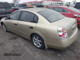 2002 Nissan Altima S with VIN 1N4AL11DX2C156685, listed as a IAAI auction lot 41821949 with 197,511 mi miles. Bid and sale history available at carsss.com. Image 3.