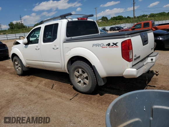 2011 Nissan Frontier Pro-4X with VIN 1N6AD0EV5BC406965, listed as a Copart auction lot 59335675 with 168,296 mi miles and Salvage title. Bid and sale history available at DreamBid. Image 2.